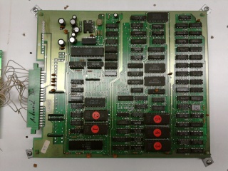wood panel with a big mounted main board on it.